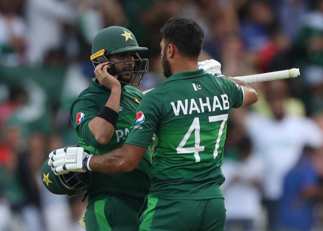 Pakistan's Imad Wasim and Wahab Riaz celebrate after winning the match. (Action Images via Reuters)