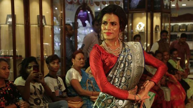 Rintu walks the ramp during the Freedom of Expression fashion show in Kolkata, West Bengal. The “Freedom of Expression” show featured a group of transgender persons dressed as mythological characters from Indian epics. (Bikas Das / AP) Rintu walks the ramp during the Freedom of Expression fashion show in Kolkata, West Bengal. The “Freedom of Expression” show featured a group of transgender persons dressed as mythological characters from Indian epics. (Bikas Das / AP)