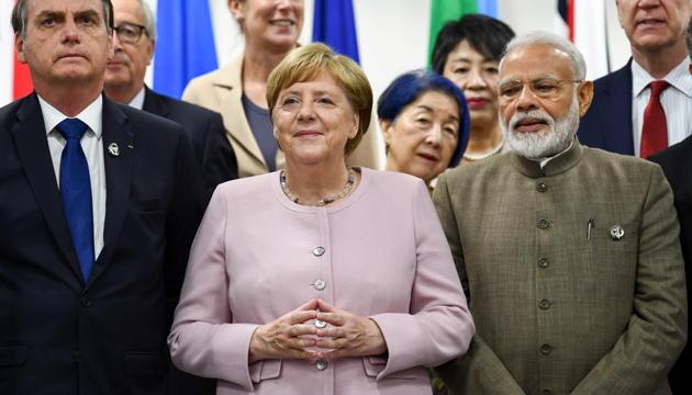 (L-R) Brazil's President Jair Bolsonaro, Germany's Chancellor Angela Merkel and India's Prime Minister Narendra Modi attend an event on women's empowerment during the G20 Summit in Osaka on June 29, 2019.(AFP photo)