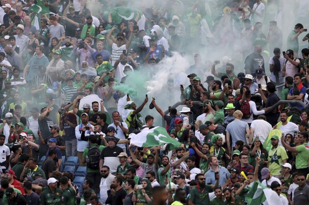 Pakistani cricket fans celebrate their team's victory over Afghanistan at Headingley. (AP)