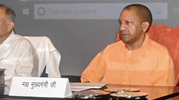 Lucknow: Uttar Pradesh Chief Minister Yogi Adityanath during a review meeting on law and order situation with senior officials at Lok Bhawan, in Lucknow, Wednesday, June 12 2019. (PTI Photo/Nand Kumar) (PTI6_12_2019_000142B)(PTI)