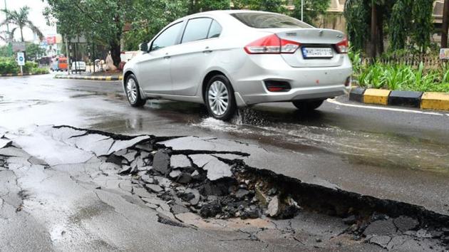 Road slide at anand nagar near horizon School Ghodbunder road in Thane (Praful Gangurde/ HT Photo) Road slide at anand nagar near horizon School Ghodbunder road in Thane (Praful Gangurde/ HT Photo)