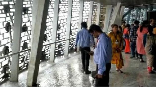 Rainwater made its way into the viewing gallery of the Statue of Unity in Gujarat, with tourists sharing videos of puddles on the floor and water dripping off the roof.(Twitter/Screengrab)