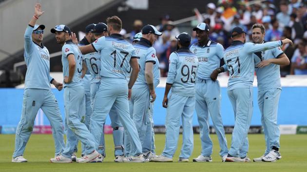 England's cricketers celebrate the win over India. (AP)
