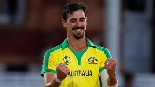 Australia's Mitchell Starc celebrates after taking the wicket of New Zealand's Mitchell Santner.(Action Images via Reuters)
