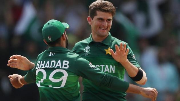 Pakistan's Shaheen Afridi and Shadab Khan celebrate taking the wicket of Afghanistan's Najibullah Zadran.(Action Images via Reuters)