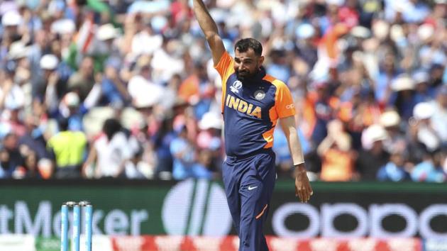 Mohammed Shami celebrates taking his fifth wicket.(AP)
