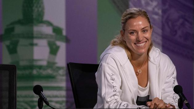 Defending women's singles champion, Germany's Angelique Kerber, speaks during a press conference.(AFP)