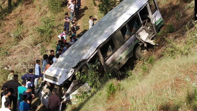 A bus, with most of its passengers as school children, fell into a gorge in Himachal Pradesh’s Shimla district, killing at least four people.(ANI Photo) A bus, with most of its passengers as school children, fell into a gorge in Himachal Pradesh’s Shimla district, killing at least four people.(ANI Photo)