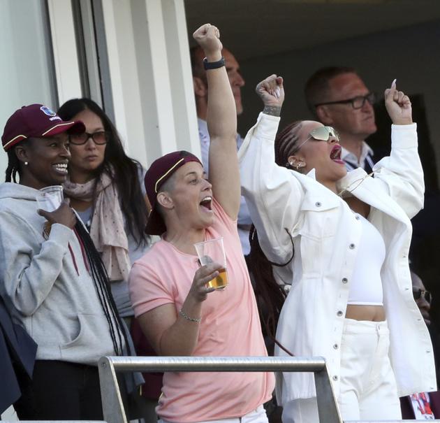 Singer Rihanna, right, reacts as she watches the match from same level as the players balcony. (AP) Singer Rihanna, right, reacts as she watches the match from same level as the players balcony. (AP)