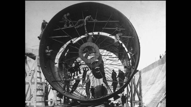 Construction of giant pipes used to divert a section of the Missouri River during the building of the Fort Peck Dam. Margaret Bourke-White’s photograph from “Franklin Roosevelt’s Wild West,” LIFE, November 23, 1936. (© LIFE Picture Collection, Meredith Corporation) Construction of giant pipes used to divert a section of the Missouri River during the building of the Fort Peck Dam. Margaret Bourke-White’s photograph from “Franklin Roosevelt’s Wild West,” LIFE, November 23, 1936. (© LIFE Picture Collection, Meredith Corporation)