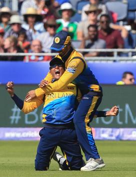 Sri Lanka's Jeffrey Vandersay (L) celebrates with teammate Dhananjaya de Silva. (AFP) Sri Lanka's Jeffrey Vandersay (L) celebrates with teammate Dhananjaya de Silva. (AFP)