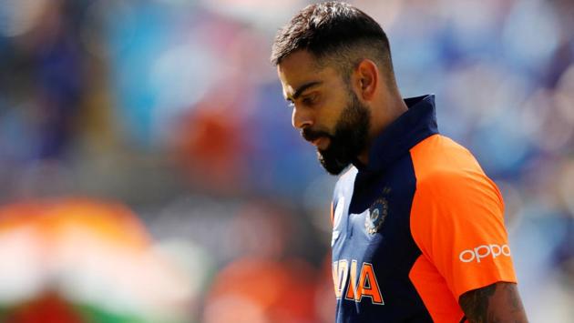 Virat Kohli looks dejected as he walks off after losing his wicket during the ICC World Cup 2019 match against England.(Action Images via Reuters)