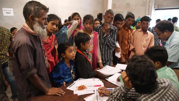 Assam State National Register of Citizens (NRC) officials check documents in Dhubri, Assam. Nagaland is set to prepare a list of all indigenous inhabitants of the state, a notification issued Saturday said. Preparation of the Register of Indigenous Inhabitants of Nagaland (RIIN) will begin July 10 and is being undertaken to stop issuance of Indigenous Inhabitant Certificates (IIC) to ineligible persons, the notification said. (Biju Boro / AFP File) Assam State National Register of Citizens (NRC) officials check documents in Dhubri, Assam. Nagaland is set to prepare a list of all indigenous inhabitants of the state, a notification issued Saturday said. Preparation of the Register of Indigenous Inhabitants of Nagaland (RIIN) will begin July 10 and is being undertaken to stop issuance of Indigenous Inhabitant Certificates (IIC) to ineligible persons, the notification said. (Biju Boro / AFP File)