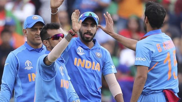 India's Bhuvneshwar Kumar, right, celebrates after the dismissal of Bangladesh's captain Mashrafe Mortaza. (AP)