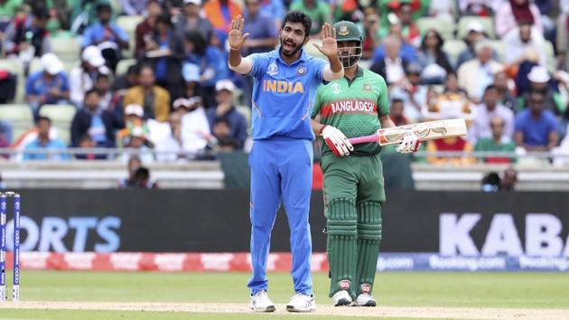 India's Jasprit Bumrah gestures to team fielders. (AP) India's Jasprit Bumrah gestures to team fielders. (AP)