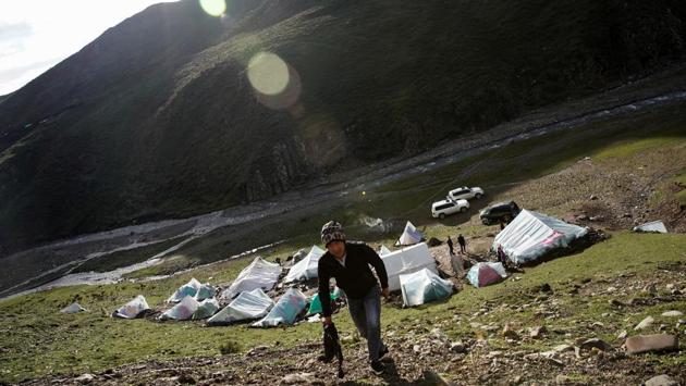 A base camp of cordyceps pickers is seen on a mountain in the Amne Machin range. At the market peak in 2010, the street price of cordyceps was more than $100,000 per kilogramme, launching a craze and enticing herders and farmers like Ma to flock to the mountains. Some experts say the enthusiasm has led to overharvesting on top of a less-hospitable climate, despite official insistence on sustainable production. (Aly Song / REUTERS) A base camp of cordyceps pickers is seen on a mountain in the Amne Machin range. At the market peak in 2010, the street price of cordyceps was more than $100,000 per kilogramme, launching a craze and enticing herders and farmers like Ma to flock to the mountains. Some experts say the enthusiasm has led to overharvesting on top of a less-hospitable climate, despite official insistence on sustainable production. (Aly Song / REUTERS)