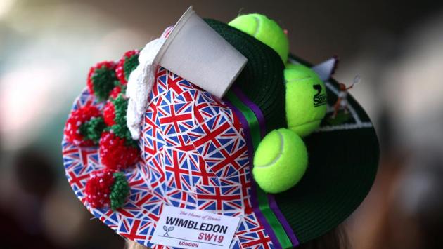 A spectator’s ornate hat at All England Lawn Tennis and Croquet Club on Monday. In recent years, the dress code for spectators has become more relaxed but dressing smartly is still an unofficial expectation. Those in the Royal Box in particular are asked not to wear hats, in case it blocks the view of others around them. (REUTERS)