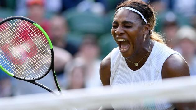 Serena Williams reacts during her women's singles first round match.(AFP)