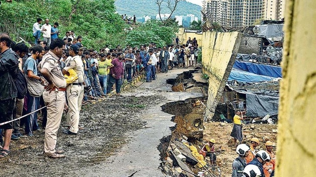 Boundary wall collapse of Sanjay Gandhi National Park at Pimpripada,Kurar Village,Malad in Mumbai.(Pramod Thakur/ Hindustan Times)