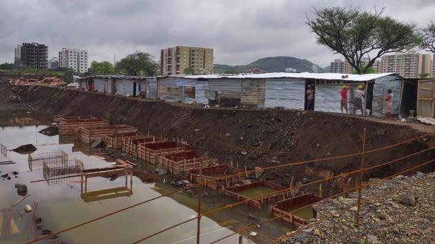 The action by PMC, comes after Rajeev Jadhav, state labour commissioner, asked officials to shift shanties housing construction workers set up at risky locations to safer ones.(HT PHOTO) The action by PMC, comes after Rajeev Jadhav, state labour commissioner, asked officials to shift shanties housing construction workers set up at risky locations to safer ones.(HT PHOTO)