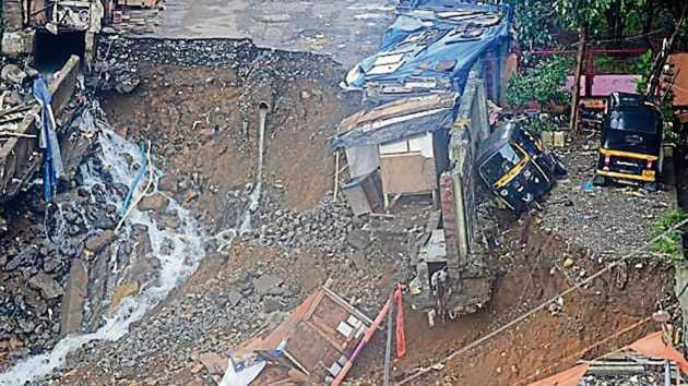 Road Caved in at Sangharsh Nagar Chandivali powai in Mumbai. (Photo by Vijayanand Gupta/Hindustan Times)