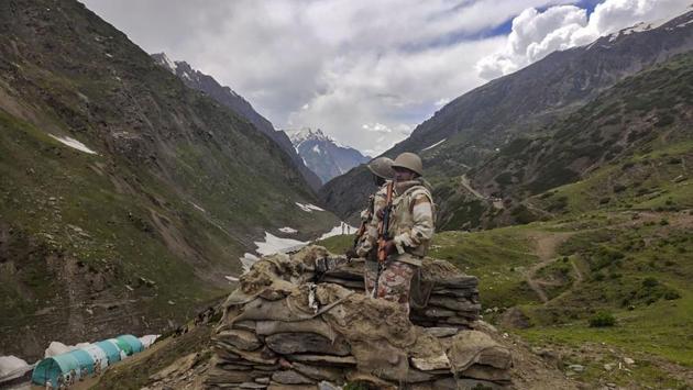 Indo-Tibetan Border Police personnel stand guard the route to the cave shrine of Amarnath, in Ganderbal district of Jammu and Kashmi. At least 40,000 police and soldiers have been deployed to guard the pilgrimage. Carrying automatic rifles and wearing flak jackets, they have set up checkpoints, barricades and temporary camps along the routes. (PTI) Indo-Tibetan Border Police personnel stand guard the route to the cave shrine of Amarnath, in Ganderbal district of Jammu and Kashmi. At least 40,000 police and soldiers have been deployed to guard the pilgrimage. Carrying automatic rifles and wearing flak jackets, they have set up checkpoints, barricades and temporary camps along the routes. (PTI)