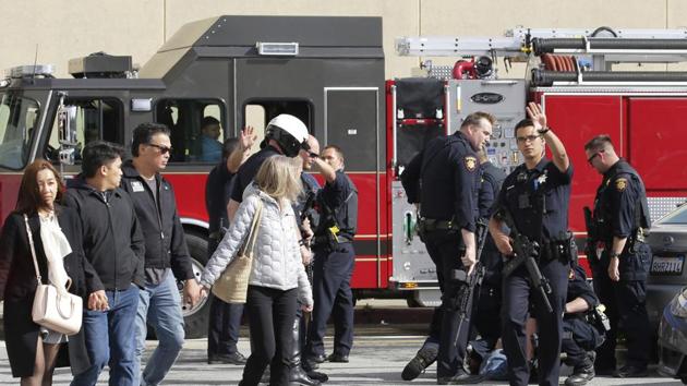Police detain a man outside of the Tanforan Mall as shoppers are escorted out in San Bruno, Calif., Tuesday, July 2, 2019. Police are searching for suspects after at least two people were wounded in a mall shooting near San Francisco on Tuesday that led to region-wide transit delays at rush hour. (AP Photo/Stephanie Mullen)(AP) Police detain a man outside of the Tanforan Mall as shoppers are escorted out in San Bruno, Calif., Tuesday, July 2, 2019. Police are searching for suspects after at least two people were wounded in a mall shooting near San Francisco on Tuesday that led to region-wide transit delays at rush hour. (AP Photo/Stephanie Mullen)(AP)