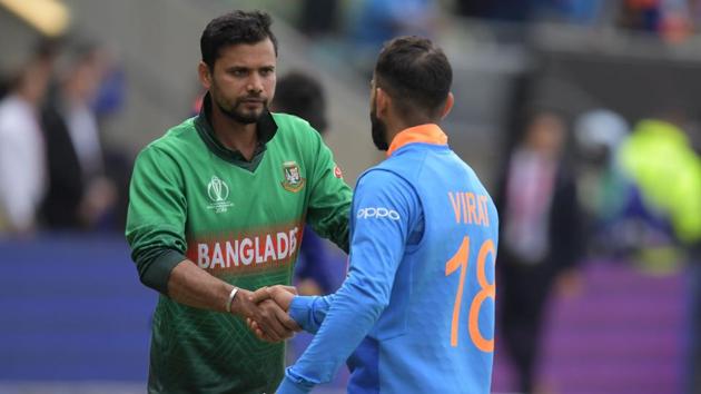 India vs Bangladesh: Virat Kohli with Mashrafe Mortaza (AFP)