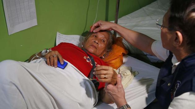 The health ministry said 261 well-wishers had been rushed to nine hospitals by Wednesday afternoon after eating food that had been prepared for 2,500 people.(AP) The health ministry said 261 well-wishers had been rushed to nine hospitals by Wednesday afternoon after eating food that had been prepared for 2,500 people.(AP)
