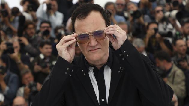 Director Quentin Tarantino poses for photographers at the photo call for the film Once Upon a Time in Hollywood at the 72nd international film festival.(Vianney Le Caer/Invision/AP)
