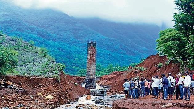 A view of the Tiware dam which breached following incessant rains, At least 14 people were killed and many went missing after Tiware dam broke on Tuesday night amid heavy rains in Chiplun taluka of Ratnagiri district India, on Wednesday, July 3, 2019. (Photo by Anil Phalke) A view of the Tiware dam which breached following incessant rains, At least 14 people were killed and many went missing after Tiware dam broke on Tuesday night amid heavy rains in Chiplun taluka of Ratnagiri district India, on Wednesday, July 3, 2019. (Photo by Anil Phalke)
