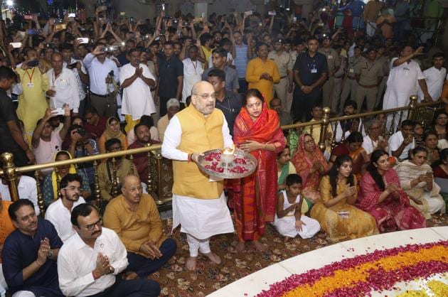Union Home Minister Amit Shah, along with his wife Sonal Shah, performed the ‘Mangala Aarti’ on Thursday morning at the historic Jagannath Temple here, to kick-start the annual Gujarat Jagannath Rath Yatra that coincides with the Puri festival.(PTI)