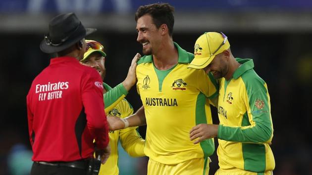 Australia's Mitchell Starc (C) celebrates with teammates after taking the wicket.(AFP) Australia's Mitchell Starc (C) celebrates with teammates after taking the wicket.(AFP)
