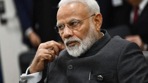 India's Prime Minister Narendra Modi attends a meeting with US President Donald Trump and Japanese Prime Minister Shinzo during the G20 Osaka Summit in Osaka on June 28, 2019.(AFP)