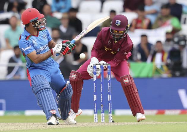 Afghanistan's Najibullah Zadran, left, bats during the Cricket World Cup match. (AP) Afghanistan's Najibullah Zadran, left, bats during the Cricket World Cup match. (AP)