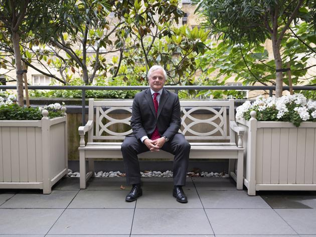Alexander Hoare, partner and the 11th generation member of the Hoare family, poses for a photograph in the enclosed garden of C. Hoare & Co. “It’s a constant tension because part of what makes us completely different to the clearing banks is that we are smaller and more personable and more human and more relatable to customers,” “We don’t want to be herded and we don’t want to grow. We want to be special,” Alexander said. (Bryn Colton / Bloomberg)