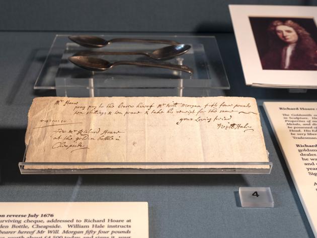 The bank’s oldest surviving cheque from William Hale, addressed to Richard Hoare, at the “Sign of the Golden Bottle”, in Cheapside, dates from July 1676 and sits on display in the museum at C. Hoare & Co. The last of the 10th generation of partners retired last year, leaving the bank in the hands of six partners from the 11th generation who have continued its evolution. In March, they opened the first outpost outside London. (Bryn Colton / Bloomberg)