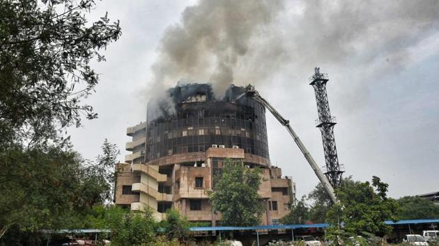 A fire broke on the sixth floor at the Directorate General of Health Services (DGHS) office in Delhi’s Karkardooma. 22 fire tenders were rushed to the spot on Friday afternoon. At least 400 people, including employees were inside the building when the fire started spreading. (Sanchit Khanna / HT Photo) A fire broke on the sixth floor at the Directorate General of Health Services (DGHS) office in Delhi’s Karkardooma. 22 fire tenders were rushed to the spot on Friday afternoon. At least 400 people, including employees were inside the building when the fire started spreading. (Sanchit Khanna / HT Photo)