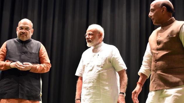 Home Minister Amit Shah, Prime Minister Narendra Modi and Union Minister of Defence of India Rajnath Singh during the BJP parliamentary party meeting, at Parliament Library, in New Delhi, India, on Tuesday, July 02, 2019.(Sonu Mehta/HT PHOTO) Home Minister Amit Shah, Prime Minister Narendra Modi and Union Minister of Defence of India Rajnath Singh during the BJP parliamentary party meeting, at Parliament Library, in New Delhi, India, on Tuesday, July 02, 2019.(Sonu Mehta/HT PHOTO)