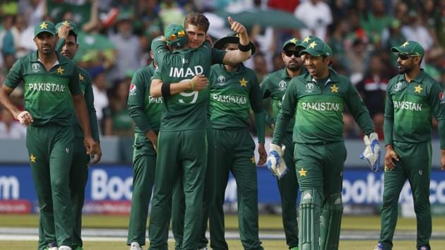 Pakistan's Shaheen Afridi, centre gives a thumbs up as he celebrates with teammates. (AP)