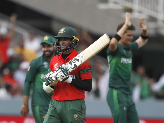 Bangladesh's Shakib Al Hasan walks off the pitch after being given out caught behind. (AP) Bangladesh's Shakib Al Hasan walks off the pitch after being given out caught behind. (AP)