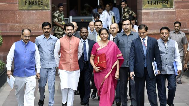Finance Minister Nirmala Sitharaman presented her maiden budget, becoming the second woman finance minister after Indira Gandhi to do so. Petrol and diesel will now be dearer by about Rs 2 per litre. Gold to get costlier as customs go up from 10% to 12.5%. “Everywhere you are required to quote PAN, you can give Aadhaar number, even for filing Income Tax return,” said Sitharamanin in her Budget speech. (Ajay Aggarwal / HT Photo) Finance Minister Nirmala Sitharaman presented her maiden budget, becoming the second woman finance minister after Indira Gandhi to do so. Petrol and diesel will now be dearer by about Rs 2 per litre. Gold to get costlier as customs go up from 10% to 12.5%. “Everywhere you are required to quote PAN, you can give Aadhaar number, even for filing Income Tax return,” said Sitharamanin in her Budget speech. (Ajay Aggarwal / HT Photo)