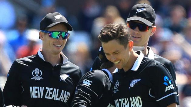 New Zealand's Trent Boult (2R) celebrates with New Zealand's captain Kane Williamson (C).(AFP)