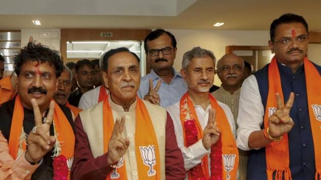 Union minister and BJP candidate S Jaishankar (2nd R) along with another party candidate Jugalji Thakor (L), Gujarat CM Vijay Rupani (2nd L) and state BJP chief Jitu Vaghani (R).(PTI File)
