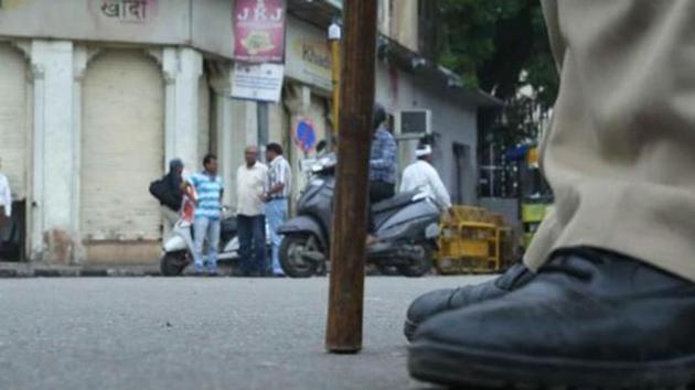 An assistant sub-inspector (ASI) of Delhi Police posted at the Keshavpuram police station was suspended for allegedly firing from his service pistol without any valid reason during duty on late Wednesday night(HT Photo)