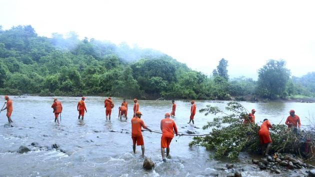 National Disaster Response Force (NDRF) has recovered 18 dead bodies so far from the dam, which breached in Ratnagiri district on June 3, creating a flood-like situation downstream.(Anil Phalke) National Disaster Response Force (NDRF) has recovered 18 dead bodies so far from the dam, which breached in Ratnagiri district on June 3, creating a flood-like situation downstream.(Anil Phalke)