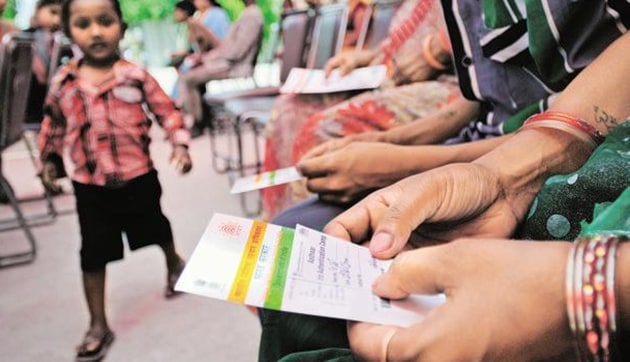 Aadhaar is an ideal identification tool given that 123 crore of the unique ID numbers have been generated so far in the country of 130 crore.(HT Photo)