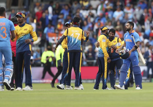 Players greet each other at the end of the Cricket World Cup match between India and Sri Lanka. (AP)