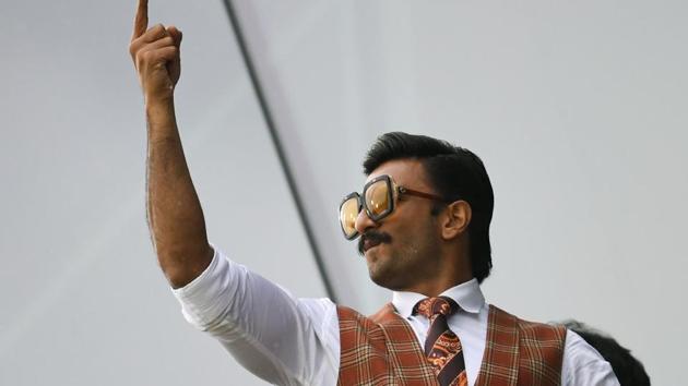 Indian Bollywood actor Ranveer Singh poses as he watches play during the 2019 Cricket World Cup group stage match between India and Pakistan at Old Trafford in Manchester, northwest England. (AFP) Indian Bollywood actor Ranveer Singh poses as he watches play during the 2019 Cricket World Cup group stage match between India and Pakistan at Old Trafford in Manchester, northwest England. (AFP)